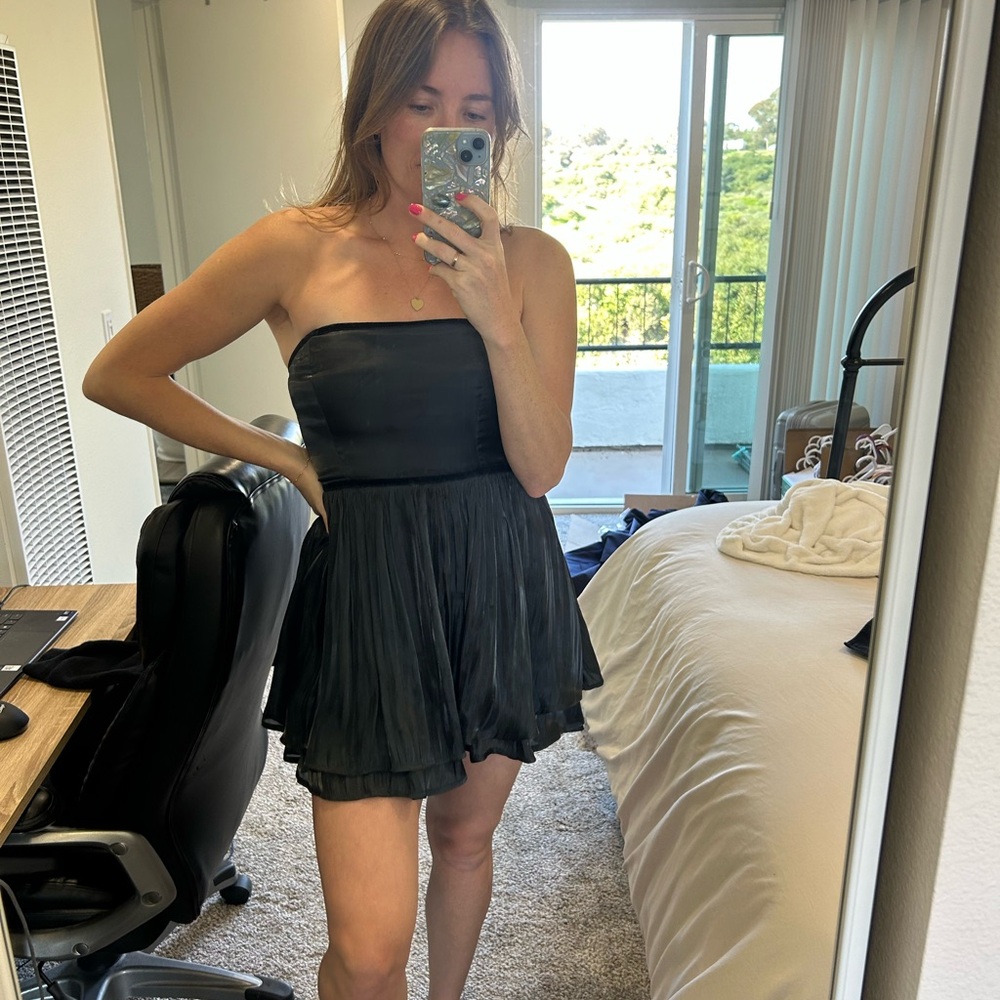 Daisy Mini Dress in Black
FREE PEOPLE